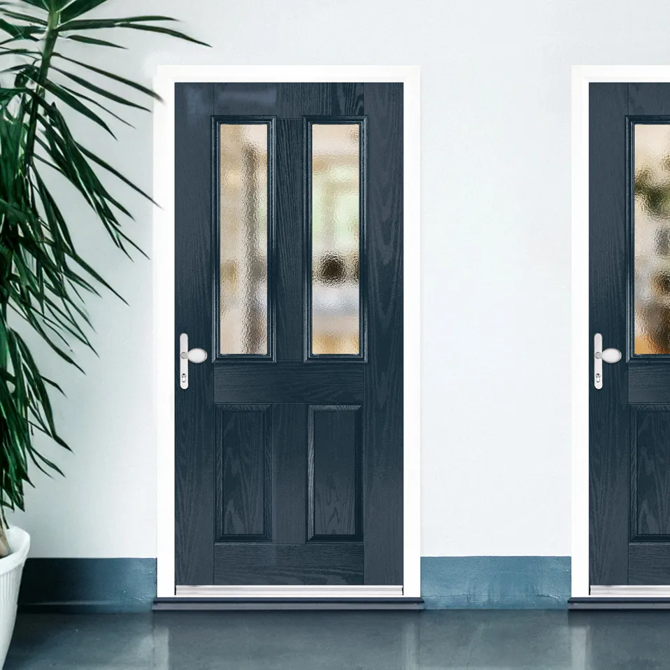Pair of navy glazed communal entrance doors in a shared hallway