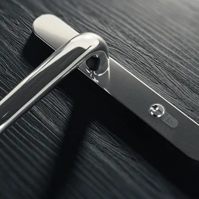 Chrome lever handle and Kitemarked high-security cylinder on an IG Doors doorset