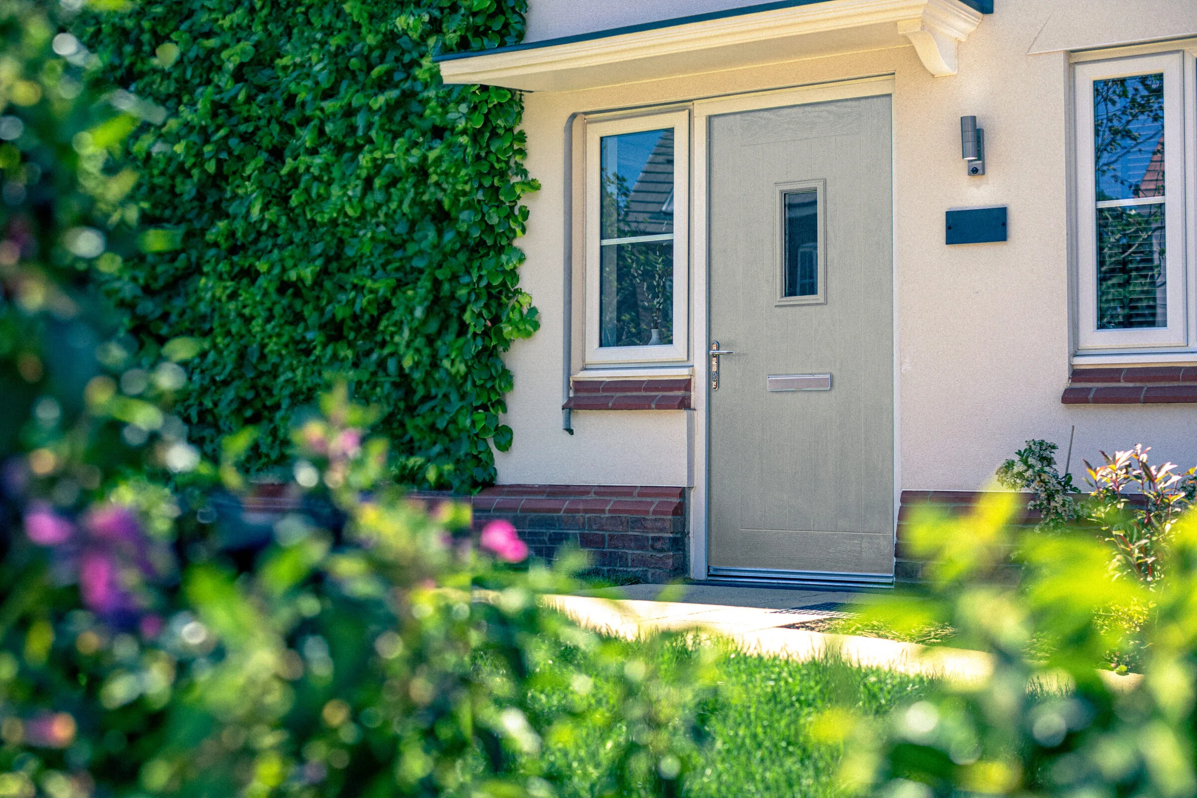 Ivy-clad house with a composite front door
